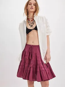 Bohemian tiered high waist skirt in magenta with drawstring detail and ruffled layers