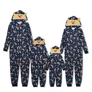 Detailed view of matching family Christmas pajamas with reindeer hoods and patterns