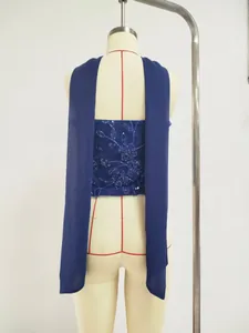 Detailed back view of a blue sequined tube top with a chic scarf neck collar