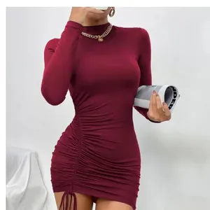 Sophisticated burgundy high-neck long-sleeve bodycon dress featuring stylish side ruched details