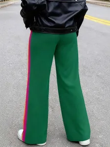 Stylish women's green wide-leg trousers with colorful side stripes and elegant fit