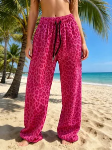 Stylish pink leopard print wide-leg pants for outdoor summer beach vacation wear