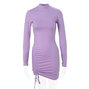 Purple long-sleeve mock neck bodycon dress featuring side ruching and drawstring