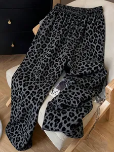 Detail of high-waisted leopard print lounge pants with elastic waistband