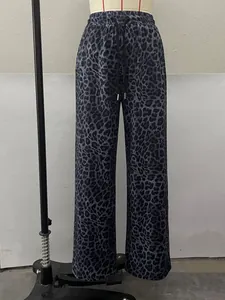 Detailed front view of women's grey leopard print wide-leg casual trousers on mannequin
