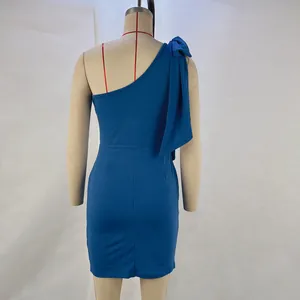 Elegant back view of a blue one-shoulder slim-fit party dress with bow detail