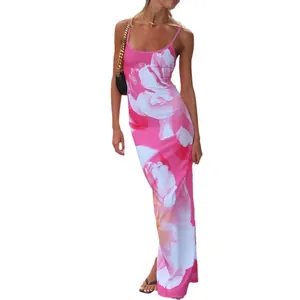 Elegantes rosa Maxikleid mit Blumendruck für ein sexy Sommer-Strandurlaub Outfit