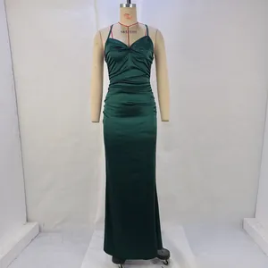 Front view of elegant emerald green satin maxi dress with pleated bodice details