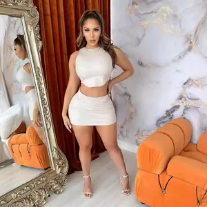 Stylish two-piece PU leather set featuring sleeveless crop top and bodycon mini skirt