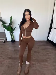 Chic brown 2-piece track suit set featuring a zip-up hoodie and high-waist flared pants
