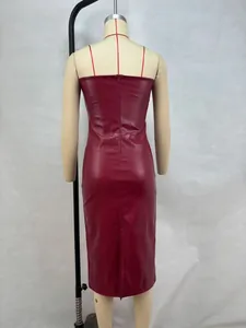 Rear view of wine red PU leather tube dress with thin straps and back zipper detail.