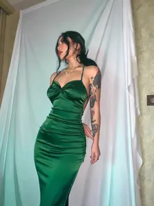 Sexy emerald green satin bodycon maxi dress with spaghetti straps and ruched detail