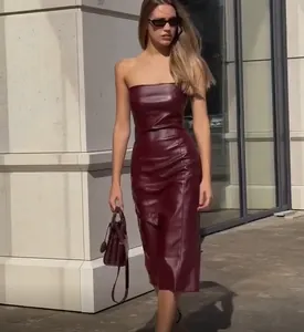 Chic burgundy strapless PU leather midi dress featuring a slim fit and side slit detail