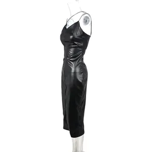 Side view of sexy black PU leather midi slip dress with bodycon fit and slit detail.