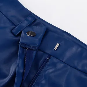 Close-up of blue PU leather pants waistband featuring metal hook closure and zipper