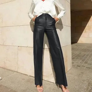 Stylish high-waisted black PU leather straight-leg trousers for women, street style.