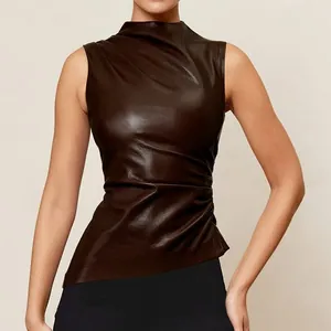 Elegant sleeveless brown leather top with mock neck and asymmetrical hem for chic women