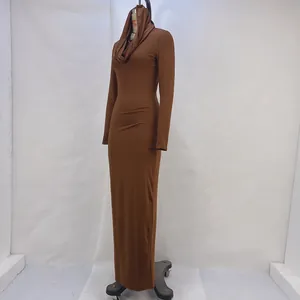 Detailed view of brown hooded bodycon long sleeve split maxi dress on a studio mannequin