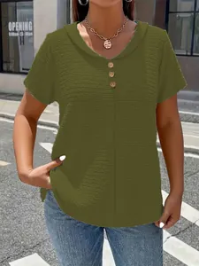 Detail view of women's green V-neck textured loose short sleeve T-shirt top