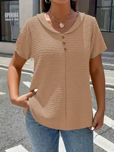 Close-up of women's brown textured short sleeve t-shirt with V-neck and buttons