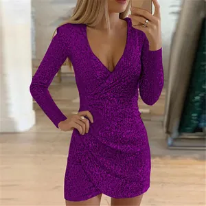 Detailed view of a sexy purple sequin mini dress with V-neck and irregular hemline