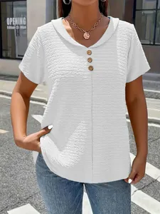 Detailed view of white textured V-neck t-shirt with decorative buttons for women.