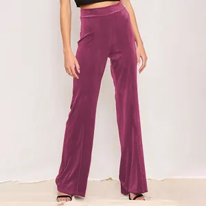 Women's elegant high waisted velvet wide leg trousers in deep magenta purple color