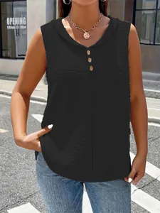Detail of women's elegant black sleeveless vest with V-neck and decorative buttons