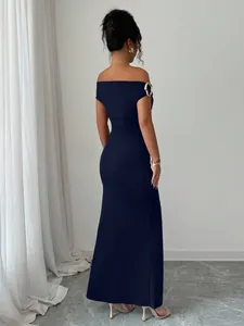 Elegant navy blue off-the-shoulder maxi dress shown from the back view profile.