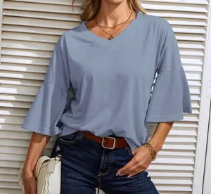 Detailed view of casual light blue V-neck T-shirt with stylish bell sleeves for women.