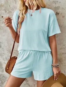 Detailed look at light blue wavy textured two-piece set with short sleeves and shorts