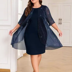 Close-up view of elegant navy blue two-piece dress set with sparkly sheer cardigan layer