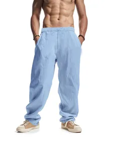 Detail of light blue men's casual linen wide-leg trousers with drawstring waist
