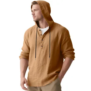 Detailed macro shot of men's hooded linen long sleeve Henley shirt in mustard brown