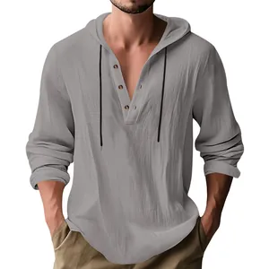Close-up of men's gray linen hooded Henley shirt with button detail and texture.
