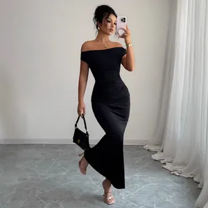 Elegant off-the-shoulder black ruched maxi dress for formal evening and party events.