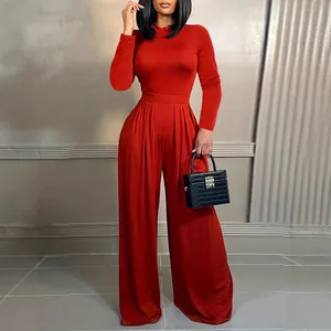 Elegant red long-sleeve high-neck jumpsuit with wide-leg pants for women