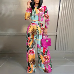 Women's tropical floral print long sleeve jumpsuit with wide leg and stand collar