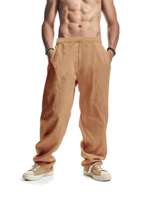Men's solid color linen casual trousers with elastic drawstring waist and wide leg fit