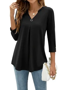 Elegant black V-neck shirt featuring 3/4 sleeves and pleated front detail for women