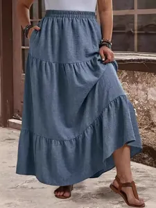 Casual plus size blue tiered maxi skirt perfect for summer vacation and resort wear