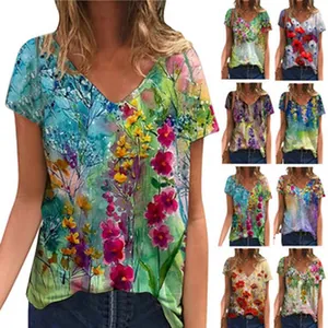 Detail view showing multiple colorful floral print variations of the V-neck T-shirt.