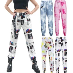 Women's high waisted printed joggers with belt featuring unique aesthetic pattern designs