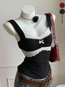 Detailed macro view of Y2K slim fit tank top featuring white lace trim and bow