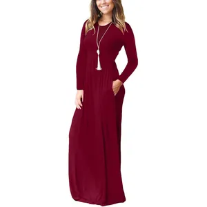 Detailed view of long-sleeved burgundy maxi dress with pockets and crew neck