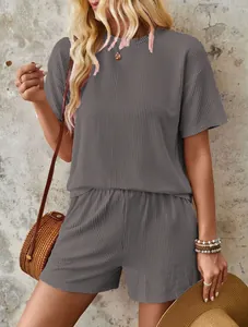 Close-up of a grey wavy texture short sleeve top and shorts two-piece set for summer