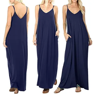 Detailed view of navy blue loose maxi dress with spaghetti straps and side pockets.