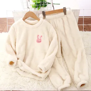 Soft white flannel children's pajama set featuring a cute pink rabbit embroidery detail