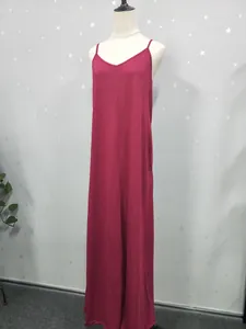 Comfortable loose fit solid magenta spaghetti strap maxi dress shown on a mannequin