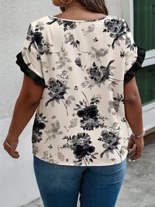 Detailed back view of a women's plus size floral blouse with ruffle sleeve accents.